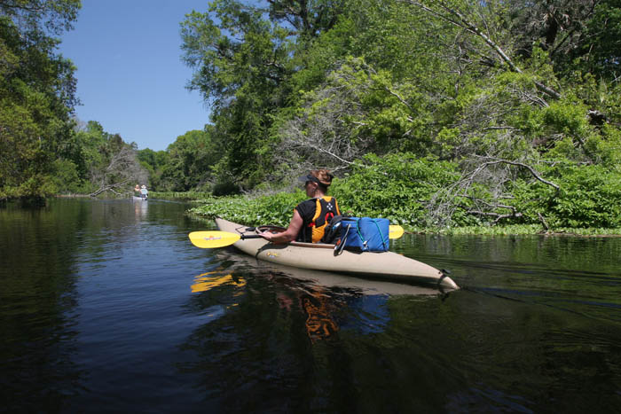 Woman paddling in a canoe at Rock Springs